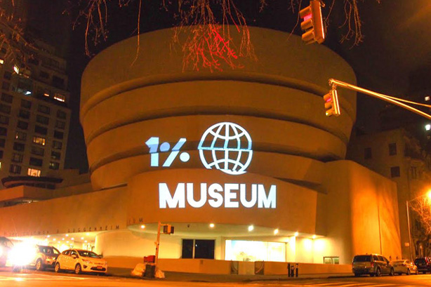 The Illuminator projection team casts light on the Guggenheim Museum in New York City as part of a GULF protest. (GULF/Nitasha Dhillon)