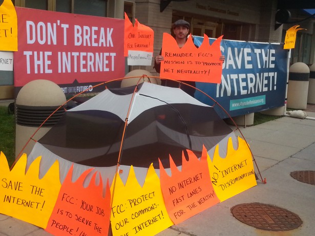 A protester at the Occupy the FCC encampment at FCC headquarters in May 2014. (Popular Resistance)