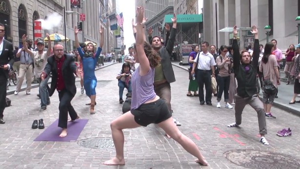 Activists doing yoga in the financial district two weeks before Occupy Wall Street, as a test run for their claiming of public space. (WNV / Karsten Braaten)