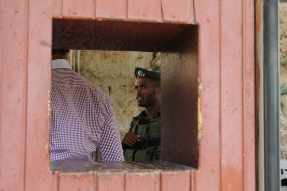 An Israeli soldier at a checkpoint in Hebron. (Left in Focus/Bryan MacCormack)