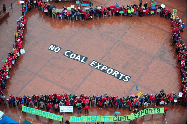 Protesters gathered in Portland's Pioneer Courthouse Square to call on Governor Kitzhaber to oppose coal exports in Oregon and the Pacific Northwest in March. (Power Past Coal / Alex Milan Tracy)