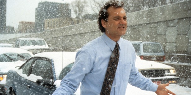 Bill Murray runs through the snow in a scene from the film 'Groundhog Day', 1993. (Photo by Columbia Pictures/Getty Images)
