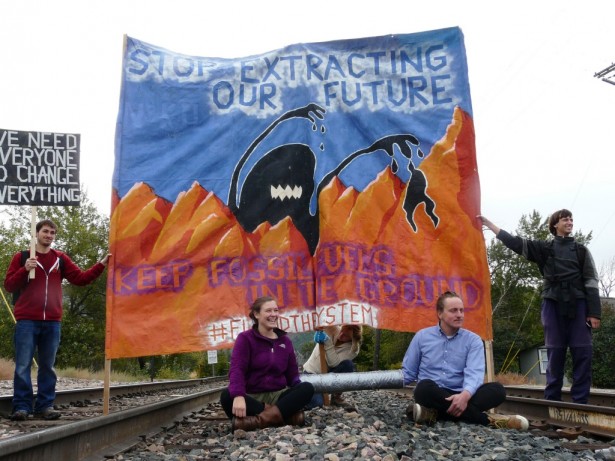 Protesters block a coal train from entering downtown Missoula in 2015. (Blue Skies Campaign)