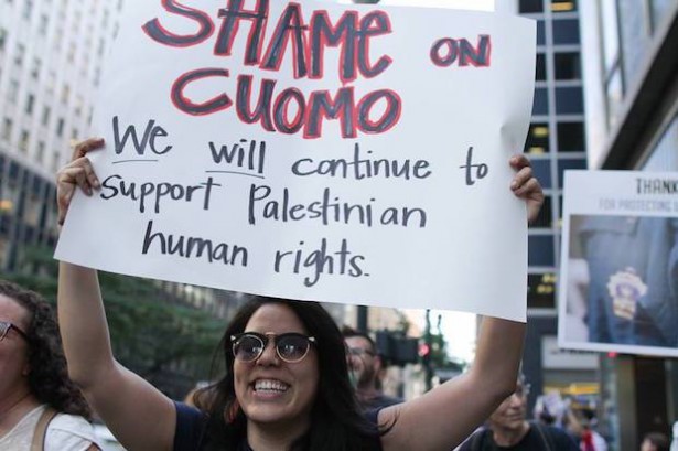 A protester at a demonstration against New York Gov. Cuomo’s anti-BDS executive order, in New York City on June 9, 2016 (Jewish Voice for Peace/Jake Ratner)