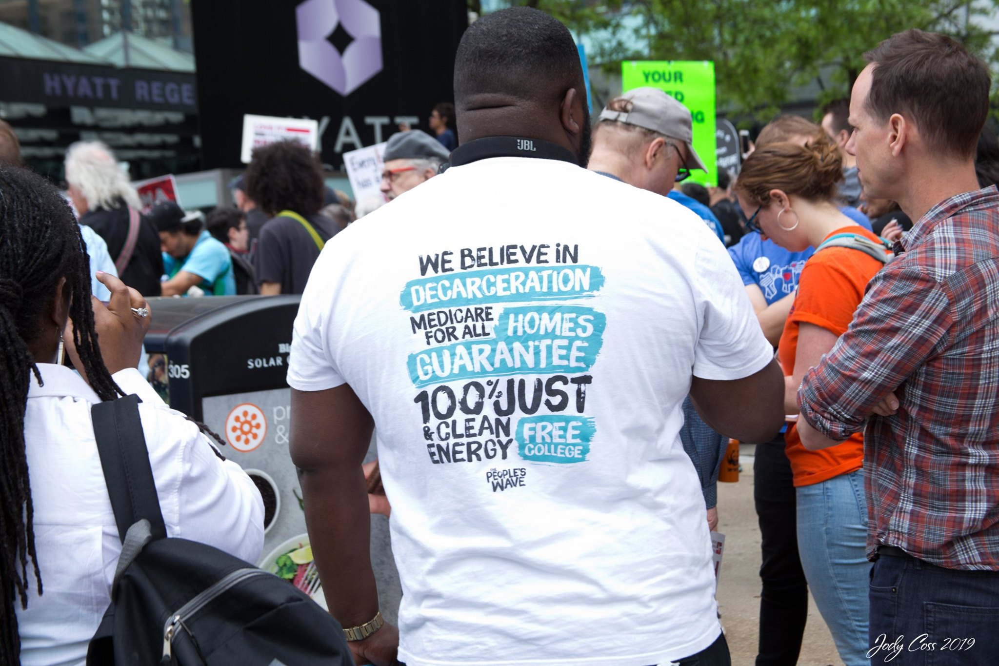 A People's Action T-shirt with campaign slogans informed by ideology.