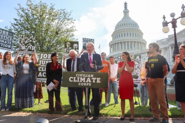 Sen. Ed Markey and Rep. Alexandria Ocasio-Cortez introducing the Civilian Climate Corps Act of 2021 outside the Capitol.