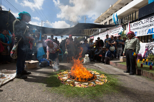 Mayan spiritual guides hold a ceremony outside the offices of the public prosecutor's office
